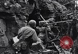 Image of US Marines look for remaining Japanese defenders Iwo Jima, 1945, second 49 stock footage video 65675026283