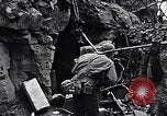 Image of US Marines look for remaining Japanese defenders Iwo Jima, 1945, second 51 stock footage video 65675026283