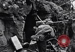 Image of US Marines look for remaining Japanese defenders Iwo Jima, 1945, second 52 stock footage video 65675026283
