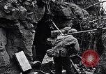 Image of US Marines look for remaining Japanese defenders Iwo Jima, 1945, second 53 stock footage video 65675026283