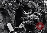 Image of US Marines look for remaining Japanese defenders Iwo Jima, 1945, second 54 stock footage video 65675026283