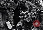 Image of US Marines look for remaining Japanese defenders Iwo Jima, 1945, second 55 stock footage video 65675026283