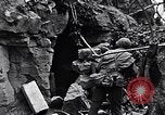 Image of US Marines look for remaining Japanese defenders Iwo Jima, 1945, second 56 stock footage video 65675026283
