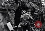 Image of US Marines look for remaining Japanese defenders Iwo Jima, 1945, second 58 stock footage video 65675026283