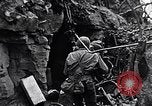 Image of US Marines look for remaining Japanese defenders Iwo Jima, 1945, second 59 stock footage video 65675026283