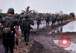 Image of search and destroy operation Vietnam, 1967, second 30 stock footage video 65675026285
