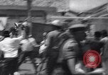Standbild Ausschreitungen Jakarta Indonesien, 1967, aus Sekunde 30 historischem Filmmaterial Videoclip 65675026448