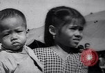 Image of mass evacuation Vietnam, 1967, second 48 stock footage video 65675026449