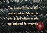 Image of use of Reed and Palm Mexico, 1941, second 32 stock footage video 65675026500