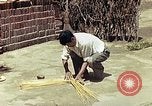 Image of reed and palm Mexico, 1941, second 44 stock footage video 65675026502