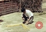 Image of reed and palm Mexico, 1941, second 47 stock footage video 65675026502