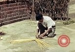 Image of reed and palm Mexico, 1941, second 56 stock footage video 65675026502