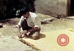 Image of reed and palm Mexico, 1941, second 52 stock footage video 65675026503