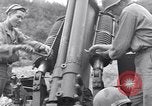 Image of U.S. Army fires 155mm howitzers during the Korean War Korea, 1951, second 48 stock footage video 65675026520