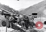 Image of U.S. Army fires 155mm howitzers during the Korean War Korea, 1951, second 56 stock footage video 65675026520