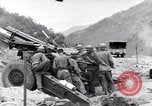 Image of U.S. Army fires 155mm howitzers during the Korean War Korea, 1951, second 58 stock footage video 65675026520