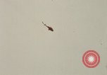 Image of U.S. Fighter bombers and Army helicopters in action during Operation J Vietnam, 1968, second 3 stock footage video 65675026532