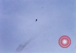 Image of U.S. Fighter bombers and Army helicopters in action during Operation J Vietnam, 1968, second 14 stock footage video 65675026532