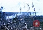 Image of U.S. Fighter bombers and Army helicopters in action during Operation J Vietnam, 1968, second 17 stock footage video 65675026532
