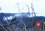 Image of U.S. Fighter bombers and Army helicopters in action during Operation J Vietnam, 1968, second 18 stock footage video 65675026532
