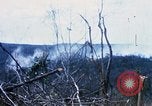 Image of U.S. Fighter bombers and Army helicopters in action during Operation J Vietnam, 1968, second 22 stock footage video 65675026532