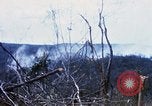 Image of U.S. Fighter bombers and Army helicopters in action during Operation J Vietnam, 1968, second 23 stock footage video 65675026532