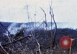 Image of U.S. Fighter bombers and Army helicopters in action during Operation J Vietnam, 1968, second 25 stock footage video 65675026532