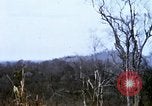 Image of U.S. Fighter bombers and Army helicopters in action during Operation J Vietnam, 1968, second 33 stock footage video 65675026532