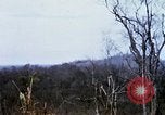 Image of U.S. Fighter bombers and Army helicopters in action during Operation J Vietnam, 1968, second 35 stock footage video 65675026532