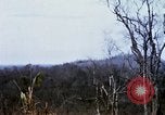 Image of U.S. Fighter bombers and Army helicopters in action during Operation J Vietnam, 1968, second 36 stock footage video 65675026532