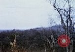 Image of U.S. Fighter bombers and Army helicopters in action during Operation J Vietnam, 1968, second 39 stock footage video 65675026532