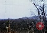 Image of U.S. Fighter bombers and Army helicopters in action during Operation J Vietnam, 1968, second 41 stock footage video 65675026532