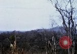 Image of U.S. Fighter bombers and Army helicopters in action during Operation J Vietnam, 1968, second 45 stock footage video 65675026532