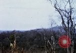 Image of U.S. Fighter bombers and Army helicopters in action during Operation J Vietnam, 1968, second 46 stock footage video 65675026532