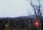 Image of U.S. Fighter bombers and Army helicopters in action during Operation J Vietnam, 1968, second 47 stock footage video 65675026532