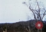Image of U.S. Fighter bombers and Army helicopters in action during Operation J Vietnam, 1968, second 48 stock footage video 65675026532