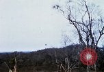 Image of U.S. Fighter bombers and Army helicopters in action during Operation J Vietnam, 1968, second 49 stock footage video 65675026532