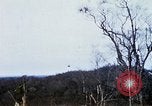 Image of U.S. Fighter bombers and Army helicopters in action during Operation J Vietnam, 1968, second 51 stock footage video 65675026532