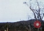 Image of U.S. Fighter bombers and Army helicopters in action during Operation J Vietnam, 1968, second 54 stock footage video 65675026532