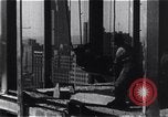 Image of Empire State Building construction New York City USA, 1930, second 37 stock footage video 65675026642