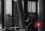 Image of Empire State Building construction New York City USA, 1930, second 42 stock footage video 65675026642