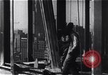 Image of Empire State Building construction New York City USA, 1930, second 43 stock footage video 65675026642