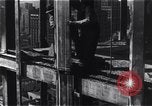 Image of Empire State Building construction New York City USA, 1930, second 48 stock footage video 65675026642