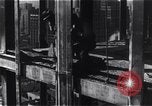 Image of Empire State Building construction New York City USA, 1930, second 50 stock footage video 65675026642