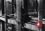 Image of Empire State Building construction New York City USA, 1930, second 54 stock footage video 65675026642