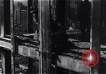 Image of Empire State Building construction New York City USA, 1930, second 59 stock footage video 65675026642