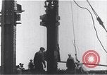 Standbild Bau des Empire State Building New York City USA, 1930, aus Sekunde 16 historischem Filmmaterial Videoclip 65675026647