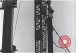 Standbild Bau des Empire State Building New York City USA, 1930, aus Sekunde 45 historischem Filmmaterial Videoclip 65675026647