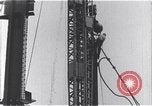 Standbild Bau des Empire State Building New York City USA, 1930, aus Sekunde 48 historischem Filmmaterial Videoclip 65675026647