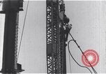 Standbild Bau des Empire State Building New York City USA, 1930, aus Sekunde 49 historischem Filmmaterial Videoclip 65675026647